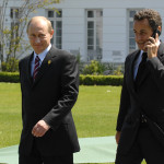 Владимир Путин и президент Франции Николя Саркози на саммите G8 в 2007 году.